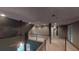 Second story hallway overlooking the living room with hardwood floors and a ceiling fan at 4255 Ben Hill Rd, Atlanta, GA 30349