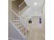 Open living space showcasing a staircase, tile flooring, and a fireplace, creating a welcoming atmosphere at 6027 Wintergreen Rd, Norcross, GA 30093
