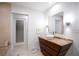 Bathroom featuring a vessel sink, marble countertop and a modern mirror with sconces at 845 Spring Nw St # 408, Atlanta, GA 30308