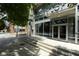 Modern building entrance with glass doors and stone accents at 845 Spring Nw St # 408, Atlanta, GA 30308