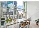 Bright dining room featuring floor to ceiling windows and modern furnishings at 845 Spring Nw St # 408, Atlanta, GA 30308
