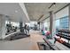 Modern gym with floor-to-ceiling windows and updated equipment at 845 Spring Nw St # 408, Atlanta, GA 30308
