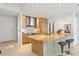 Well-lit kitchen with island seating and modern cabinets at 845 Spring Nw St # 408, Atlanta, GA 30308