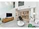 Open living area with staircase, modern furniture, and a kitchen view at 845 Spring Nw St # 408, Atlanta, GA 30308