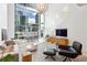Bright living room featuring high ceilings, large windows, and modern furnishings at 845 Spring Nw St # 408, Atlanta, GA 30308