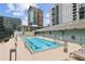 Community pool area with lounge chairs, perfect for relaxing and enjoying the outdoors at 845 Spring Nw St # 408, Atlanta, GA 30308