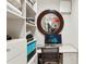 Well-organized walk-in closet featuring shelving, a desk, and a round mirror at 845 Spring Nw St # 408, Atlanta, GA 30308