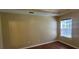 Bedroom featuring laminate flooring, neutral paint, and a window at 1934 Mcconnell Rd, Grayson, GA 30017