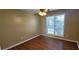 Bedroom with hardwood floors, ceiling fan and a bright window at 1934 Mcconnell Rd, Grayson, GA 30017