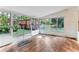Sun room with hard wood floors and view to the backyard at 1934 Mcconnell Rd, Grayson, GA 30017
