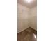 Walk-in closet with tiled floor and white wire shelving at 1934 Mcconnell Rd, Grayson, GA 30017