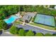 Aerial shot of community amenities including a pool, tennis courts, and a playground at 832 Topaz Vly, Canton, GA 30114