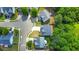 Aerial view of a suburban neighborhood showcasing well-maintained homes and landscaped yards at 832 Topaz Vly, Canton, GA 30114