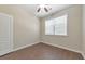 Well-lit bedroom with a ceiling fan and window at 832 Topaz Vly, Canton, GA 30114