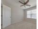 Bedroom with carpet, ceiling fan, and large window at 832 Topaz Vly, Canton, GA 30114