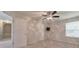 Spacious bedroom featuring a ceiling fan, a window with blinds, and neutral carpeting at 832 Topaz Vly, Canton, GA 30114