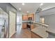 Modern kitchen features stainless appliances, granite countertops, and eat-in breakfast bar at 832 Topaz Vly, Canton, GA 30114
