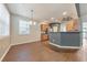 View of open kitchen and dining area with modern lighting and stainless steel appliances at 832 Topaz Vly, Canton, GA 30114