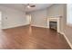 Living Room with fireplace, ceiling fan, and window to the side of the fireplace at 832 Topaz Vly, Canton, GA 30114