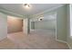 Bright living room with carpeting, large windows, and fresh paint at 832 Topaz Vly, Canton, GA 30114