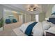 Spacious main bedroom with a tray ceiling, neutral walls, and a ceiling fan at 832 Topaz Vly, Canton, GA 30114