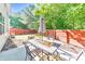 Outdoor patio with a dining table, perfect for entertaining and relaxing at 832 Topaz Vly, Canton, GA 30114