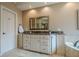 Bathroom vanity with white cabinetry, granite countertops, and convenient access to the soaking tub at 9810 Foxworth Dr, Alpharetta, GA 30022