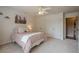 Comfortable bedroom with bright natural light, closet space, and ensuite bathroom at 9810 Foxworth Dr, Alpharetta, GA 30022