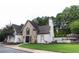 Community clubhouse with a pool beyond and a black fence, perfect for neighborhood gatherings and relaxation by the pool at 9810 Foxworth Dr, Alpharetta, GA 30022