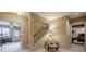 Hallway featuring stairway and access to basement at 9810 Foxworth Dr, Alpharetta, GA 30022