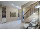 Hallway featuring stairway and built in shelving at 9810 Foxworth Dr, Alpharetta, GA 30022