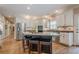 Well-equipped kitchen featuring a large island, stainless steel appliances, and hardwood floors at 9810 Foxworth Dr, Alpharetta, GA 30022