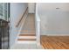 Bright entryway with staircase, wood floors, and neutral paint at 1227 Ashford Creek Ne Park, Atlanta, GA 30319