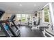 Well-equipped fitness center with treadmills, weights, and exercise machines in a bright, airy space at 1227 Ashford Creek Ne Park, Atlanta, GA 30319