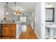 Interior view showcasing kitchen, living room, and powder room with an open floor plan at 1227 Ashford Creek Ne Park, Atlanta, GA 30319