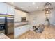 Kitchen features granite countertops, stainless steel appliances, and white cabinetry at 1227 Ashford Creek Ne Park, Atlanta, GA 30319