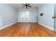 Spacious living room with hardwood floors, ample natural light, and modern finishes at 1227 Ashford Creek Ne Park, Atlanta, GA 30319