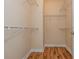 Spacious walk-in closet with multiple wire racks for organized storage at 1227 Ashford Creek Ne Park, Atlanta, GA 30319