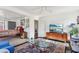 Stylishly furnished bedroom featuring neutral walls, ceiling fan, a bed with an ornate rug, and built-in storage at 1241 Briarcliff Ne Rd, Atlanta, GA 30306