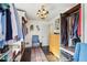 Bright closet with rods and shelves for shirts, shoes, and accessories at 1241 Briarcliff Ne Rd, Atlanta, GA 30306
