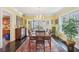 Spacious dining room with french doors, chandelier lighting, and hardwood floors at 1241 Briarcliff Ne Rd, Atlanta, GA 30306