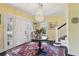 Bright foyer featuring a crystal chandelier, elegant staircase, and beautiful rug at 1241 Briarcliff Ne Rd, Atlanta, GA 30306