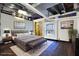 Well-lit bedroom with hardwood floors, modern art, and comfortable furnishings at 1241 Briarcliff Ne Rd, Atlanta, GA 30306