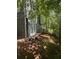 View of the side of the house, showing the sliding glass door and access to the yard at 5250 Mountain Village Ct, Stone Mountain, GA 30083