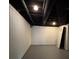 Unfinished basement with white painted walls at 5250 Mountain Village Ct, Stone Mountain, GA 30083