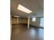 Unfinished basement with a window and door at 5250 Mountain Village Ct, Stone Mountain, GA 30083