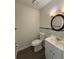 Cozy half bathroom featuring stylish tile accents at 5250 Mountain Village Ct, Stone Mountain, GA 30083