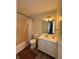 Bathroom featuring a shower/tub combination and vanity with sink at 5250 Mountain Village Ct, Stone Mountain, GA 30083