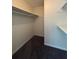 This walk in closet has ample shelving and storage space at 5250 Mountain Village Ct, Stone Mountain, GA 30083