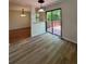 Open concept dining room with access to a wooden deck at 5250 Mountain Village Ct, Stone Mountain, GA 30083